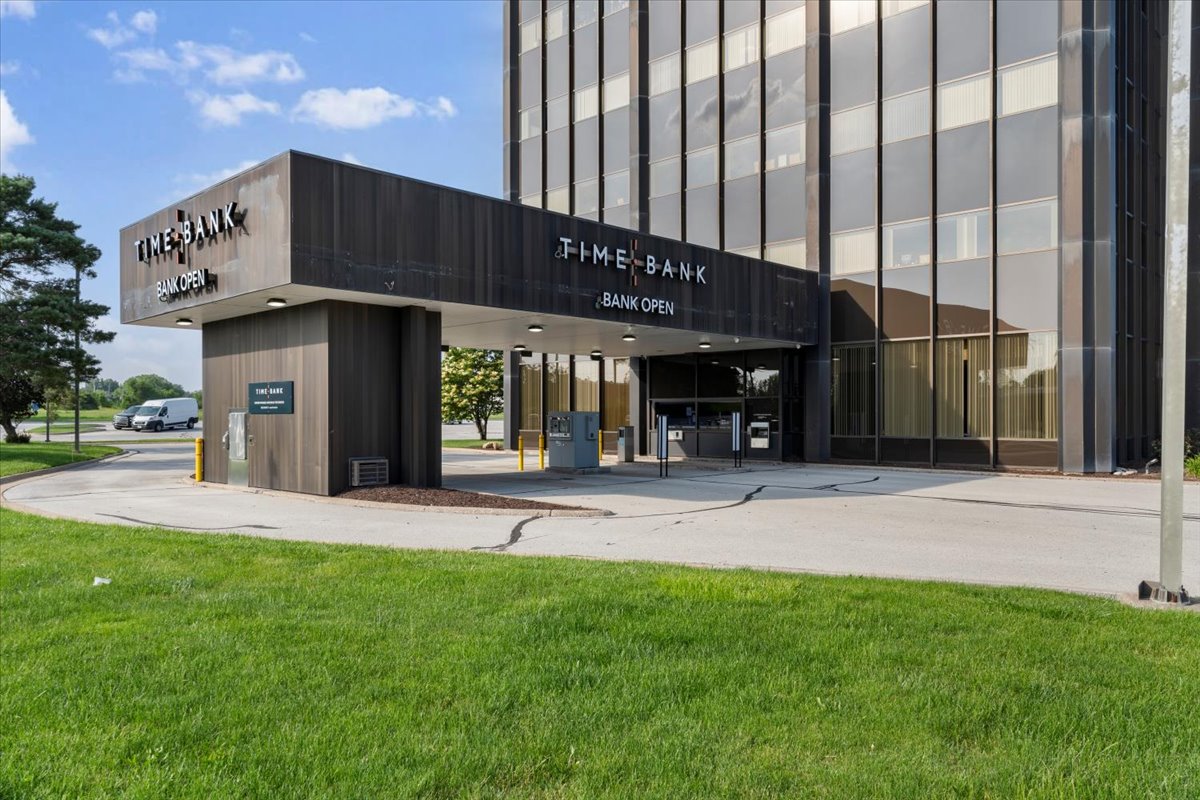 Bronze-glass entrance canopy at Iowa Towers.